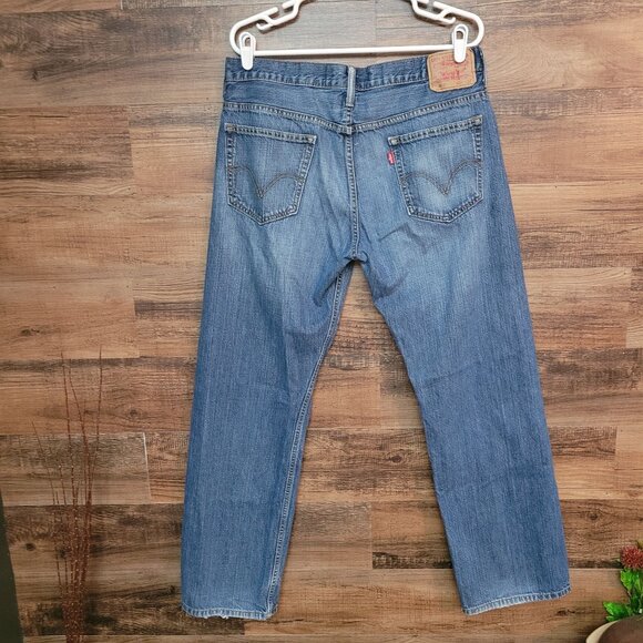 Vtg Levi's Jeans Size 34x32 Measures 34x31 Loose Straight 569 Y2K Medium Light - Picture 2 of 9